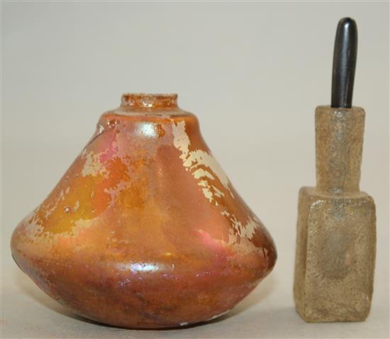 An Islamic glass unguent container, c.600 AD and a Roman glass vessel, 2nd - 4th century AD, 7cm